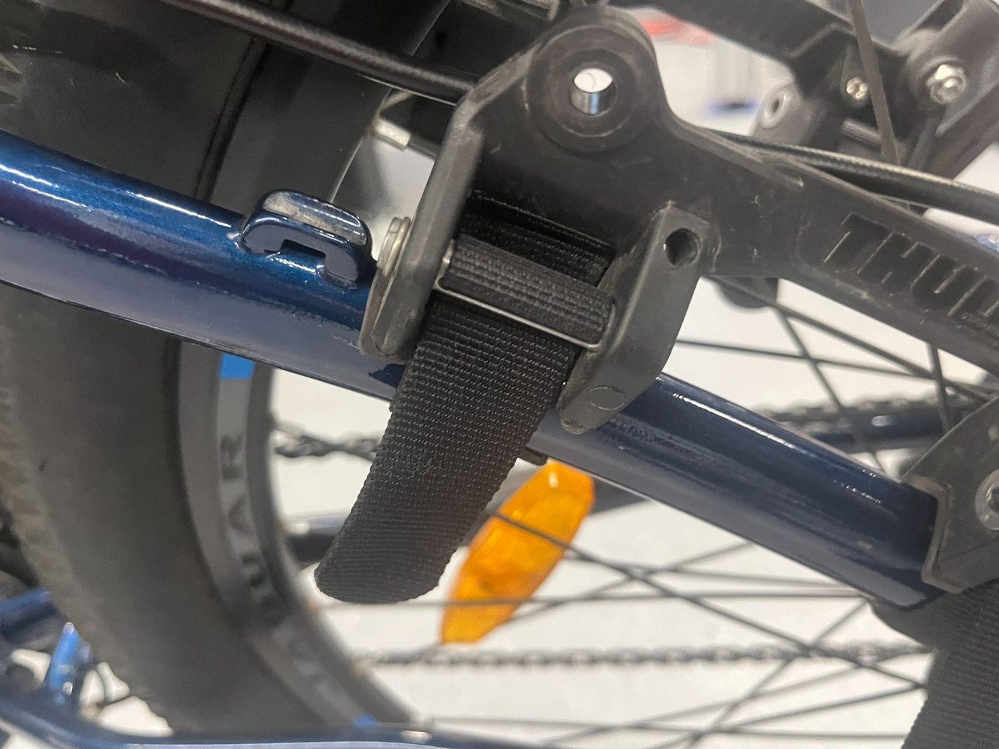 Threading the strap around the frame