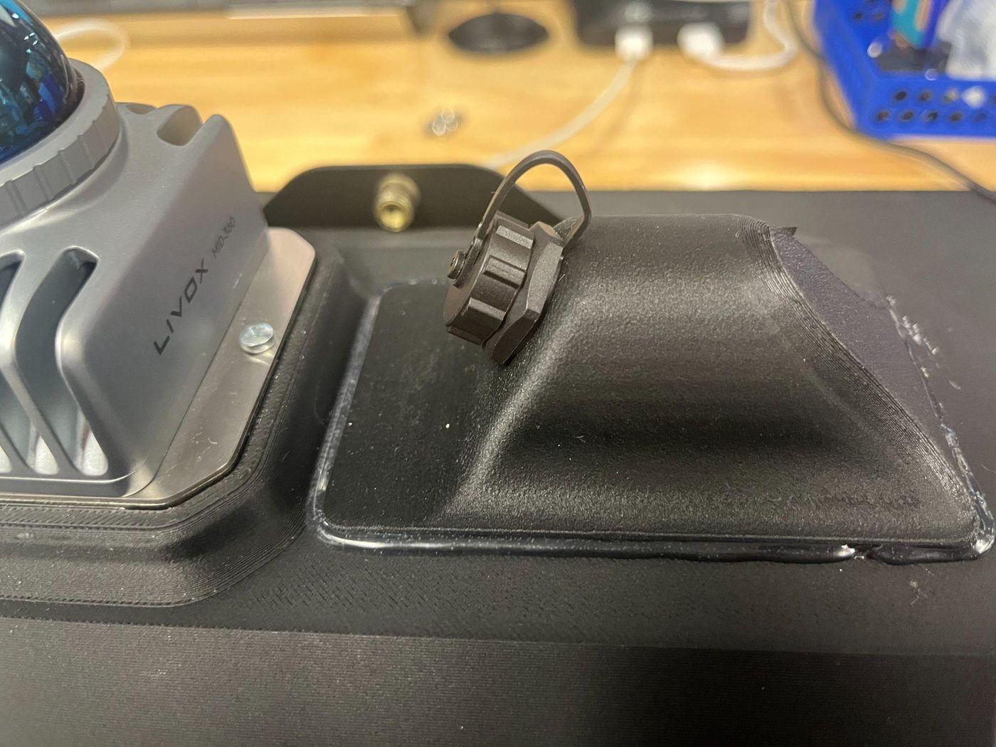 Screwing the charging port cap back on